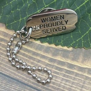 “Woman proudly served” marked dog tag lapel pin